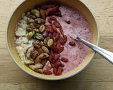 A picture of step 2 of Fresh Strawberry and blueberry yoghurt breakfast smoothie bowl.