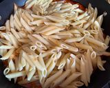 A picture of step 6 of Garlic Chicken Penne Pasta with Spicy Marinara.