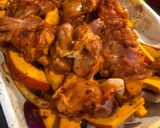 A picture of step 4 of Tray bake pumpkin & chicken thighs topped with roast pumpkin seeds.