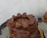 A picture of step 10 of Oven Mini pancakes with honey and choco on top.
