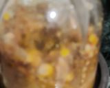 A picture of step 2 of Corn fritters in appe pan.