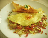 Foto del paso 5 de la receta: Tortilla a la francesa con alcachofas y bacon