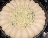 A picture of step 5 of Spinach and artichoke dip with rolls.
