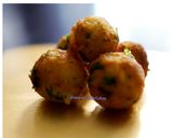 A picture of step 3 of Parmesan cheese potato balls.