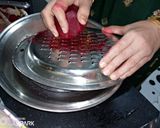 A picture of step 1 of Beetroot halwa.