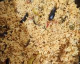 A picture of step 7 of Brinjal pulao.