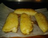 A picture of step 16 of Overstuffed Calzones.