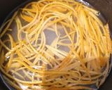 Une image de l'étape 4 de Zestes d'orange confits rapide.