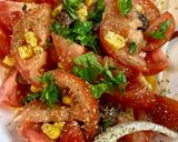 A picture of step 2 of Tomato Salad with Sweet Corn and Olives.