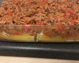 A picture of step 11 of Cheese and Spinach stuffed Cannelloni with a meat ragù.