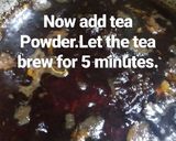 A picture of step 2 of Ginger jaggery tea.