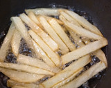 Foto del paso 6 de la receta: Conejo al ajillo, con patatas fritas