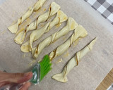 Foto del paso 4 de la receta: Lacitos de hojaldre con pesto rosso