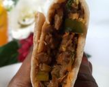 A picture of step 14 of Saucy beef wraps.