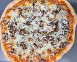 A picture of step 8 of Mushroom Pizza.