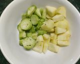 A picture of step 1 of Spinach Cucumber Apple Green Smoothie.