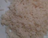A picture of step 7 of Scrambled eggs with white Rice.