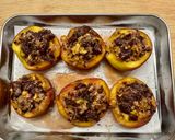 A picture of step 5 of Baked Peaches with Amaretti, Dark Chocolate, Ice Cream and Mint.