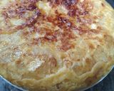 A picture of step 6 of Spanish Potato Omelette with Caramelized Onions.