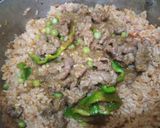 A picture of step 4 of Carrot rice.
