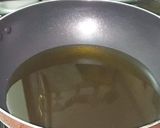 A picture of step 3 of Chilli garlic oil.