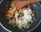 A picture of step 9 of Schezwan Fried Rice.