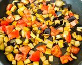 A picture of step 3 of Warm aubergine salad with giantwholewheat couscous and smoked cheese.