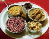 A picture of step 1 of SAKKARAI PONGAL(SWEET PONGAL) WITH RED RICE.