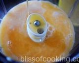 A picture of step 5 of Orange kulfi (made with fresh juice).
