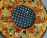صورة لخطوة 8 من وصفة بيتزا 🍕 بعجينة سحرية 😋 وشكل رائع 👍❤️