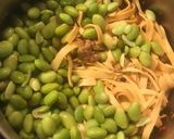A picture of step 3 of Pan fry ground pork with Bean curd sheet, edamame and preserved mustard stem.