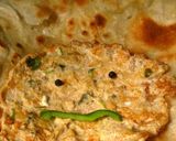 A picture of step 2 of Anda with lachedaar paratha.