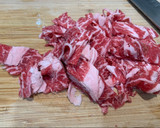 A picture of step 4 of Tofu, Bitter melon, Pork and Egg Stir fry.