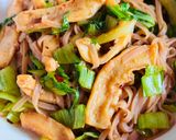 A picture of step 7 of Stir-Fried Brown Rice Pho with Octopus & Mustard Greens.