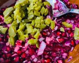 A picture of step 2 of Seared Mango, Pomegranate & Cactus Salsa.