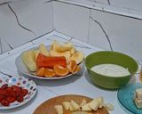 Foto langkah ke 1 dari resep Fruit Salad with Yogurt Cream.