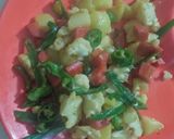 A picture of step 5 of Vegetable Coconut Curry.