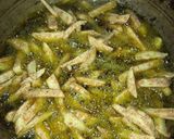 A picture of step 3 of Crispy Masala fries.