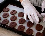 A picture of step 10 of Chocolate Sandwich Cookies / Crispy Cocoa Cookies filled with a Smooth Chocolate Cheese Cream.