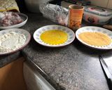 A picture of step 1 of Mother’s pork steak in breadcrumbs with cheese and tomatoes.
