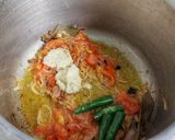 A picture of step 3 of Aloo Matar Pulav.
