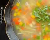 A picture of step 4 of Paneerjal (Whey) vegetable soup.