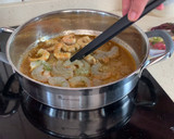 Foto del paso 4 de la receta: Arroz caldoso de pulpo y langostinos