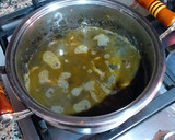 Foto del paso 15 de la receta: Calamares en su tinta con un toque de pasta de curry verde