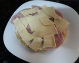 Foto del paso 7 de la receta: Tortilla de española con jamón york y queso