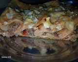 صورة لخطوة 4 من وصفة عيش سورى باللحمه المفرومه والجبنه الموزاريلا🌯