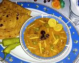 A picture of step 12 of Lauki Chane ki Dal Gosht.