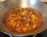 A picture of step 10 of White Pumpkin Curry.