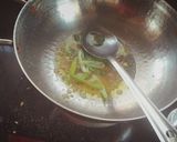 A picture of step 1 of Tomato upma.