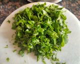 A picture of step 1 of Sagpaita- Bathua saag with chilka urad dal.